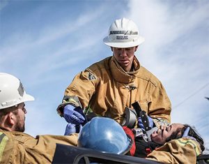 3 EMTs working on patient