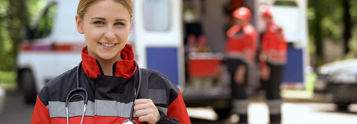 Smiling female paramedic