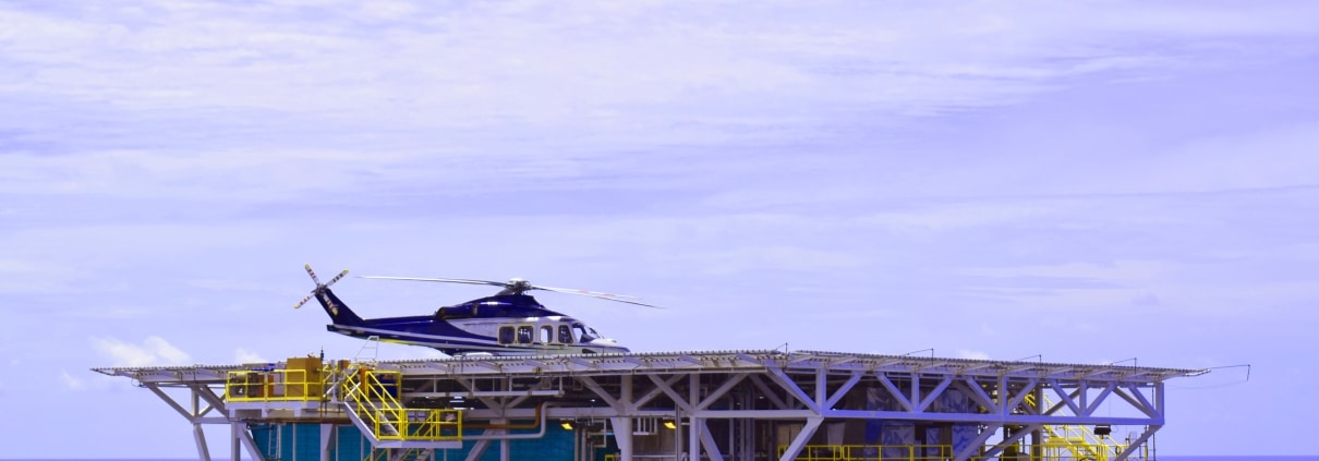View of offshore platform with helicopter
