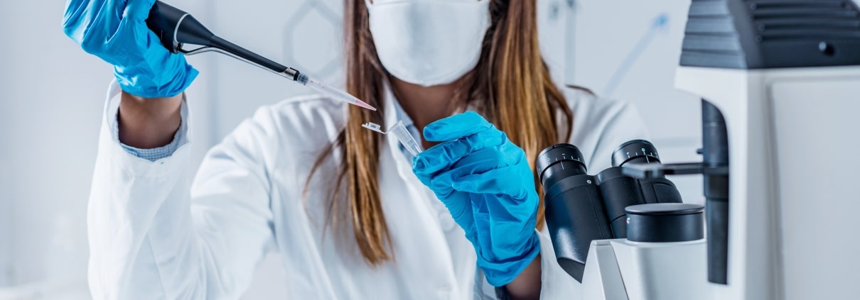 Forensic technician performing lab tests