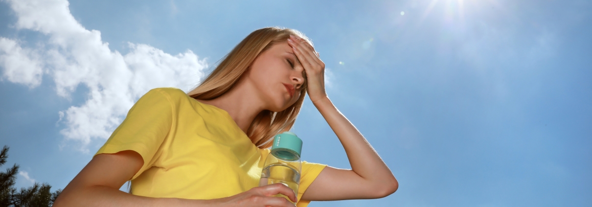Woman suffering from heat stroke
